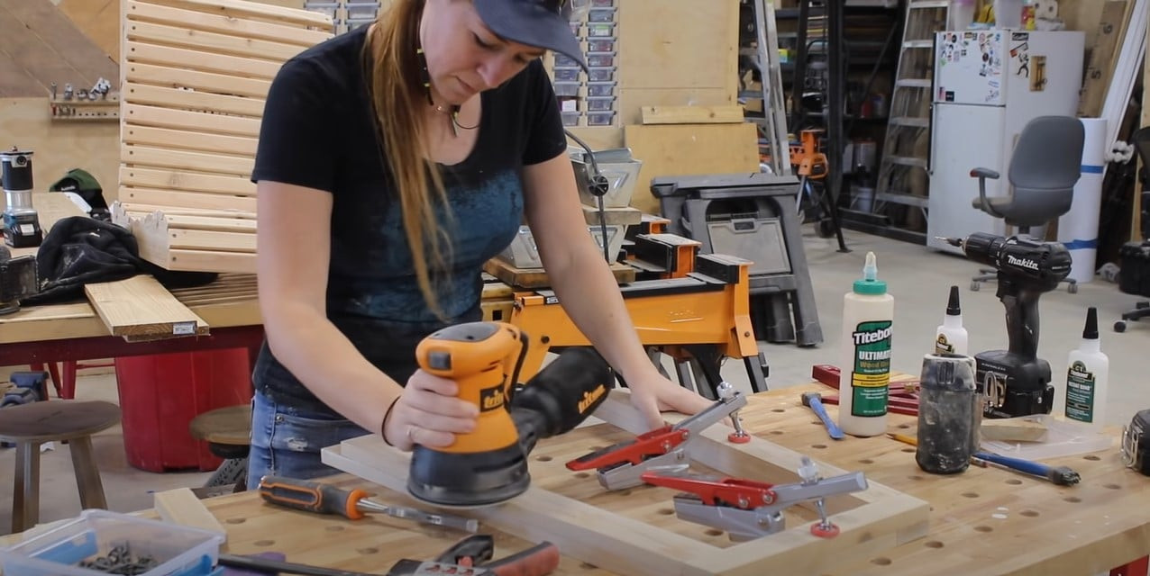 Sanding and cleaning up the details of the rocking chair frame