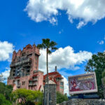 Twilight Zone Tower of Terror at Disney's Hollywood Studios with ominous clouds and a vintage hotel facade, capturing the ride's thrilling and suspenseful atmosphere