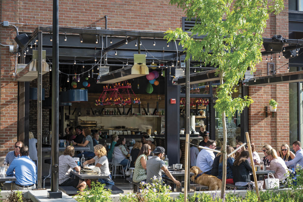 A charming street in downtown Castle Rock, CO, showcases the town's blend of historic charm and modern amenities