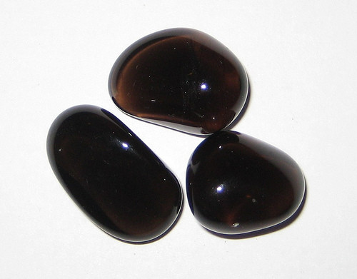 Collection of Apache tears, small, rounded obsidian nodules