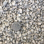 Pea gravel pathway enhancing garden aesthetics