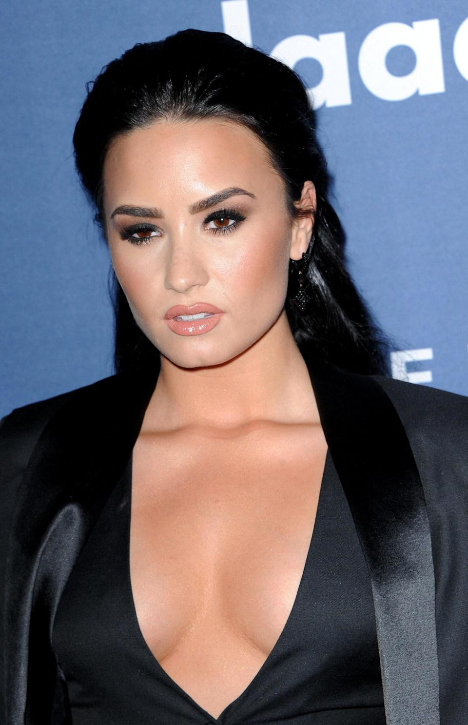Demi Lovato at 27th Annual GLAAD Media Awards, smiling and posing for a photo