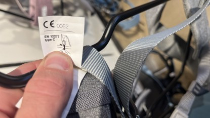 climbing harness - look for the ce or uiaa logo on the harness