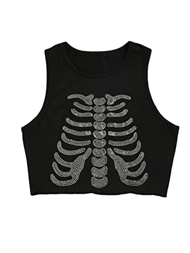 Cropped graphic tank, fishnets, and ripped jeans rock concert outfit showcasing a sleeveless graphic tee and distressed jeans