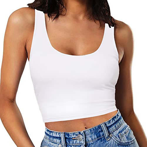 White tank, harness, leather mini skirt, and platform boots rock concert outfit featuring a workout tank top, punk waist belt, faux leather skirt, and platform boots