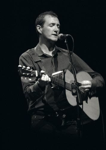 John Doyle rose to prominence with the band Solace, and developed a guitar style that is completely his own, often copied and never equalled