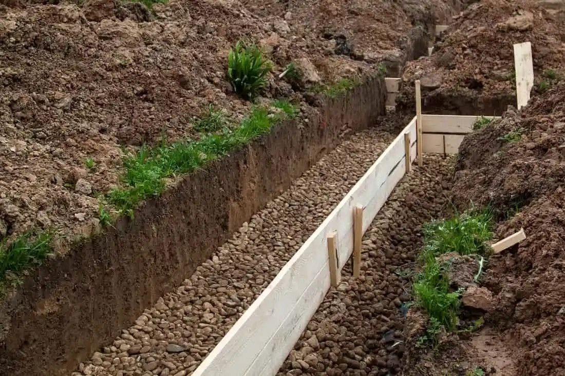 Excavating a Trench for Retaining Wall Construction