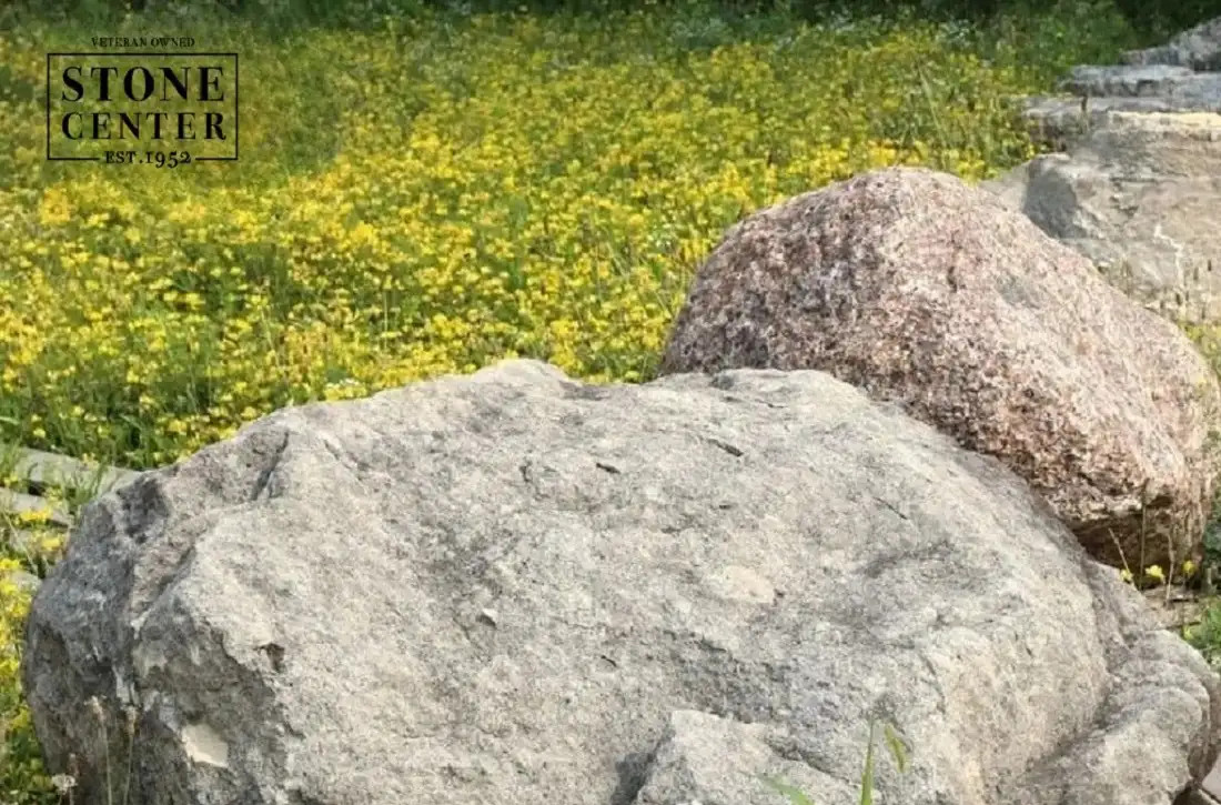 Granite rock formation, showcasing its coarse-grained texture and durability, ideal for landscaping.