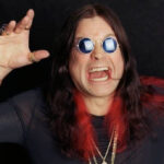 Ronnie James Dio using rock hand sign
