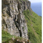 Crumbling limestone cliffs on the Isle of Purbeck, south coast of England