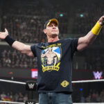 John Cena addresses the crowd during Monday Night RAW, showcasing his charisma and connection with fans.