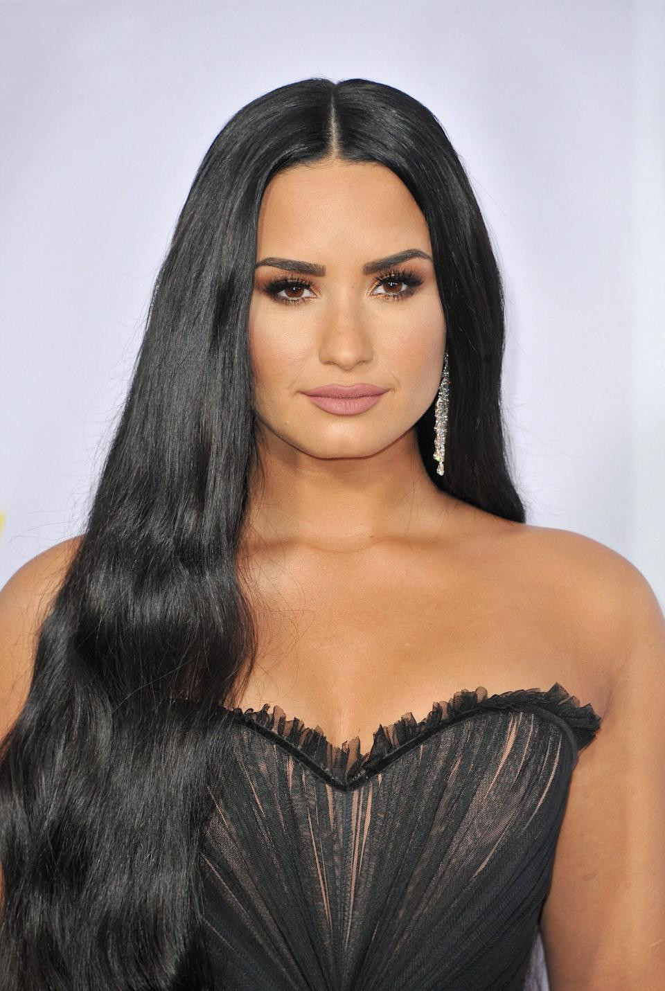 Demi Lovato at 2017 American Music Awards, performing on stage