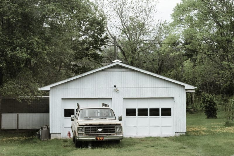 Image showcasing a band using a storage shed for practice, demonstrating resourcefulness and adaptability