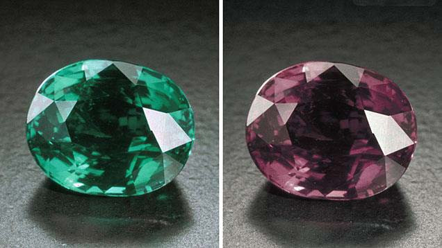 Alexandrite gemstone, displaying its color-changing properties under different lighting conditions: green in sunlight and red in incandescent light.