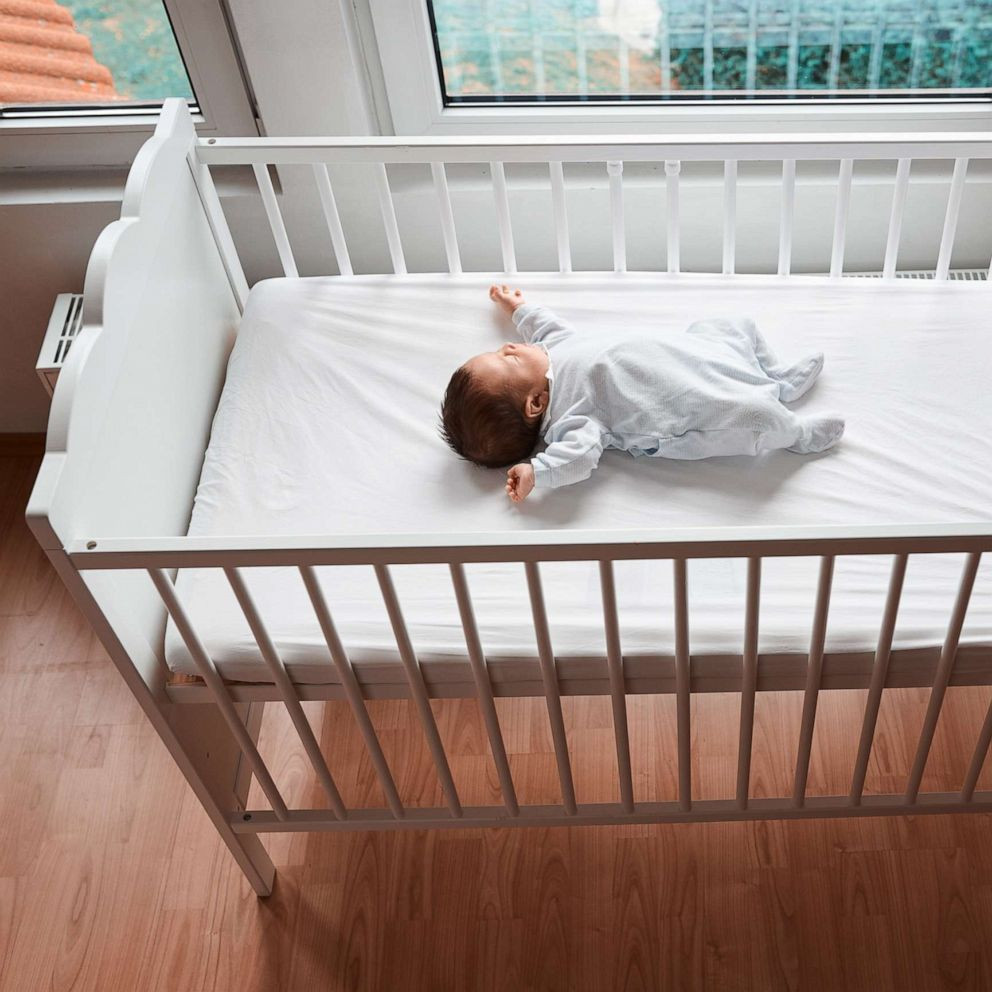 Baby Sleeping Safely in Crib