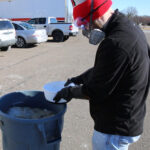 Wearing protective gear during a bleach cure of live rock