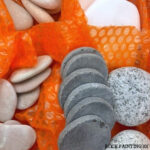 Assortment of flat rocks perfect for painting crafts.