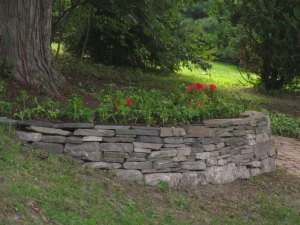 Rock wall with plants incorporated into the design