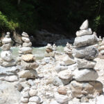 Rock cairns along a hiking trail