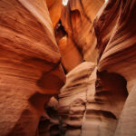 Cross-bedded layers in Navajo sandstone, showcasing the unique geological formations of Antelope Canyon
