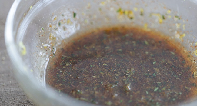 oil and herbs in a bowl