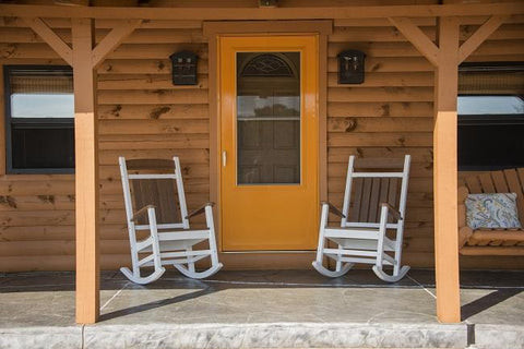 two white porch rocking chair
