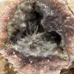 Quartz geode interior with sparkling crystal formations