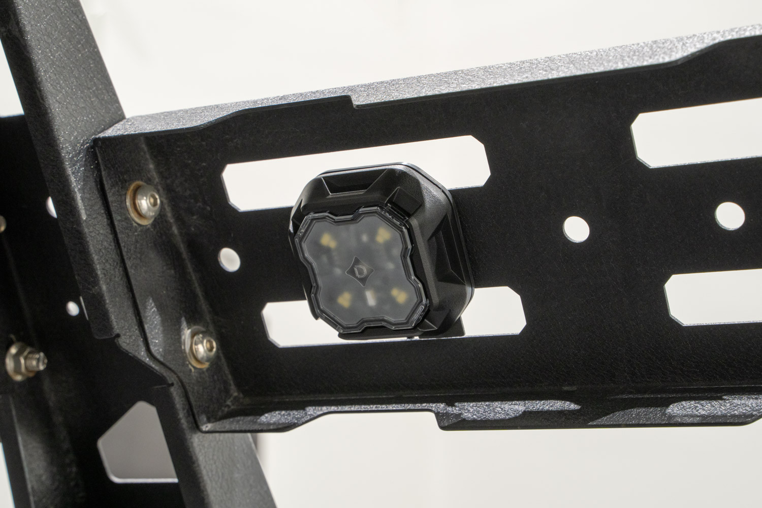 Surface-mounted rock light showcasing its low-profile design