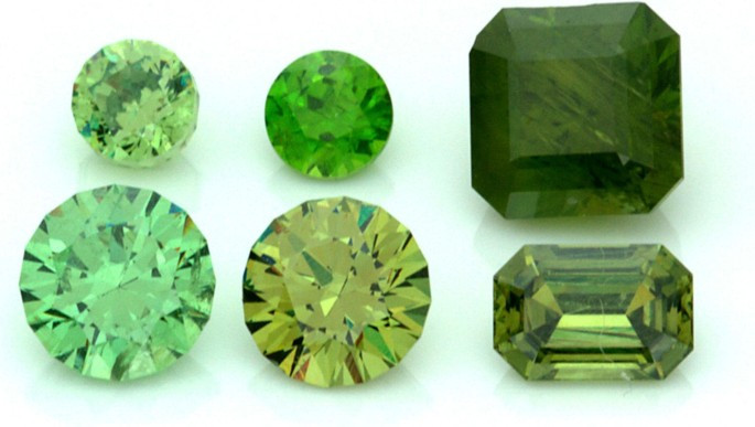 Demantoid Garnet gemstone, showcasing its vibrant green color and exceptional brilliance, discovered in the mid-1800s in Russia.