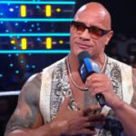 The Rock on SmackDown, showcasing his charisma and connection with the audience