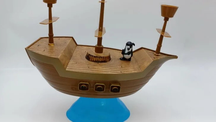 Placing a penguin on the boat