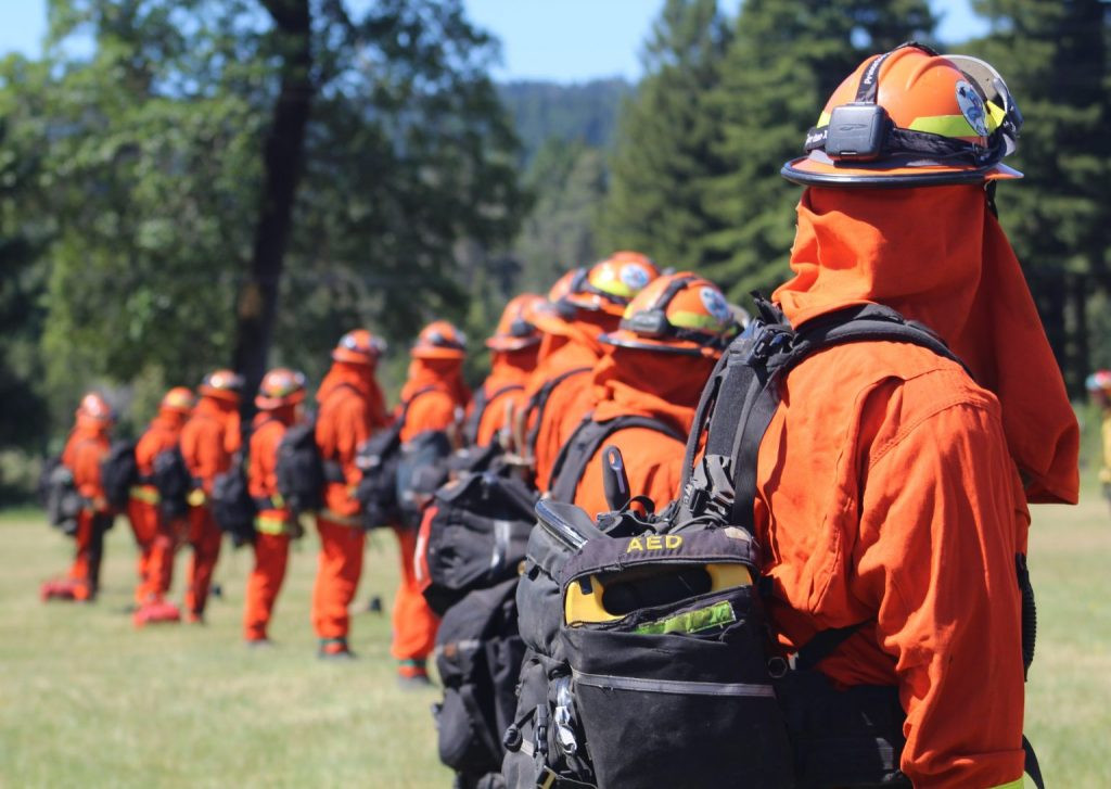 Fire camp Crew stands at attention