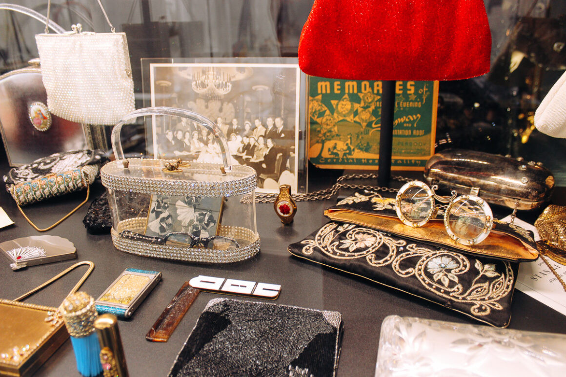 Display of purses at the ESSE Purse Museum, highlighting different styles and eras