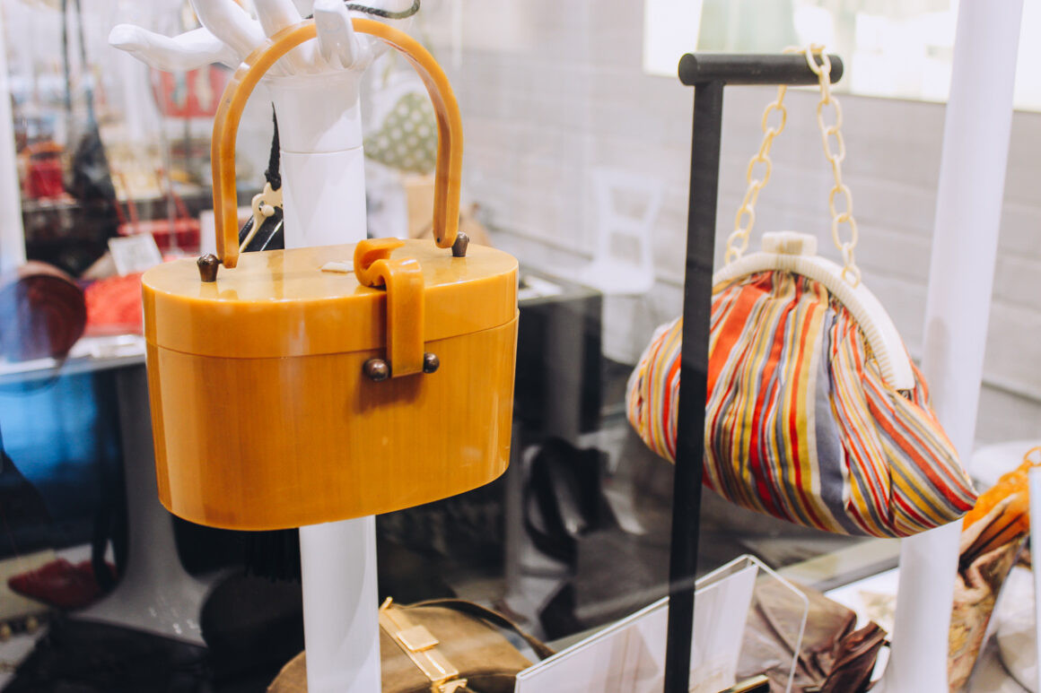 Exhibits of purses at the ESSE Purse Museum, showcasing fashion trends through the years