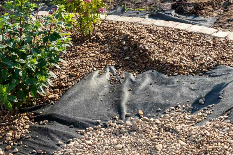 Gravel over landscape fabric