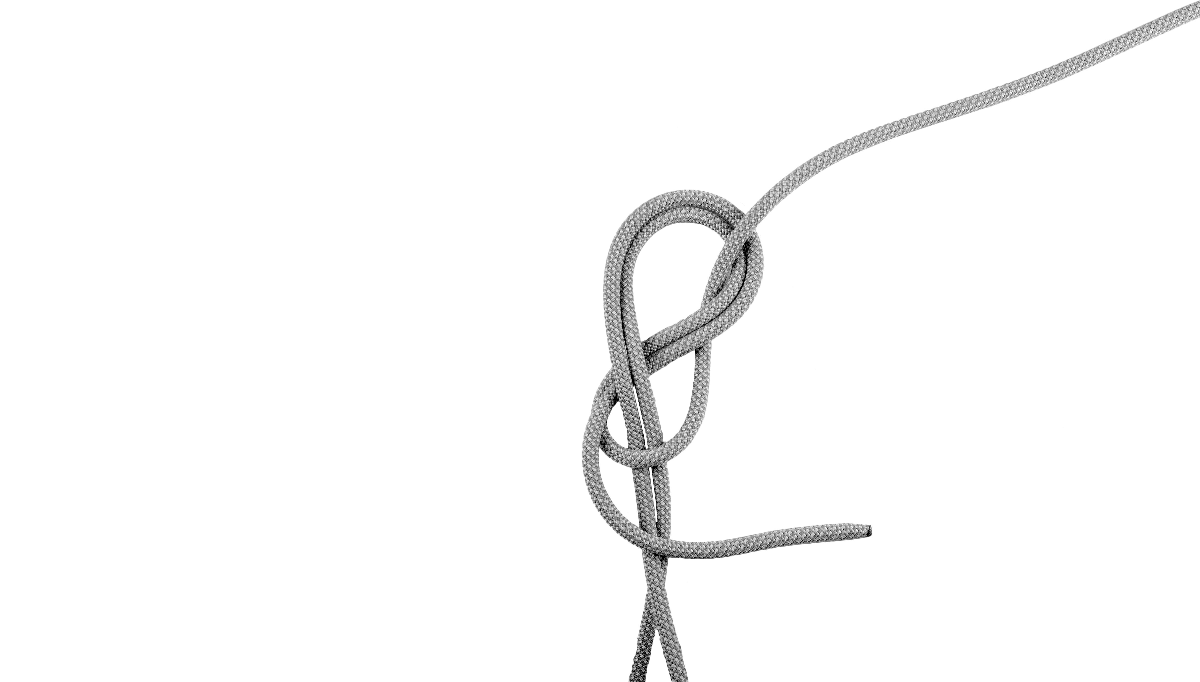 Finishing and tightening rock climbing knot