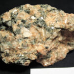 Granite from Estonia, showcasing large mineral grains indicative of slow cooling within the Earth
