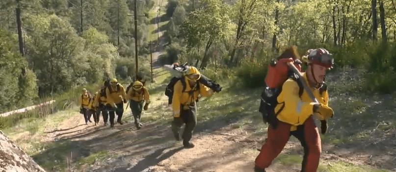 fire camp crew walking up hill
