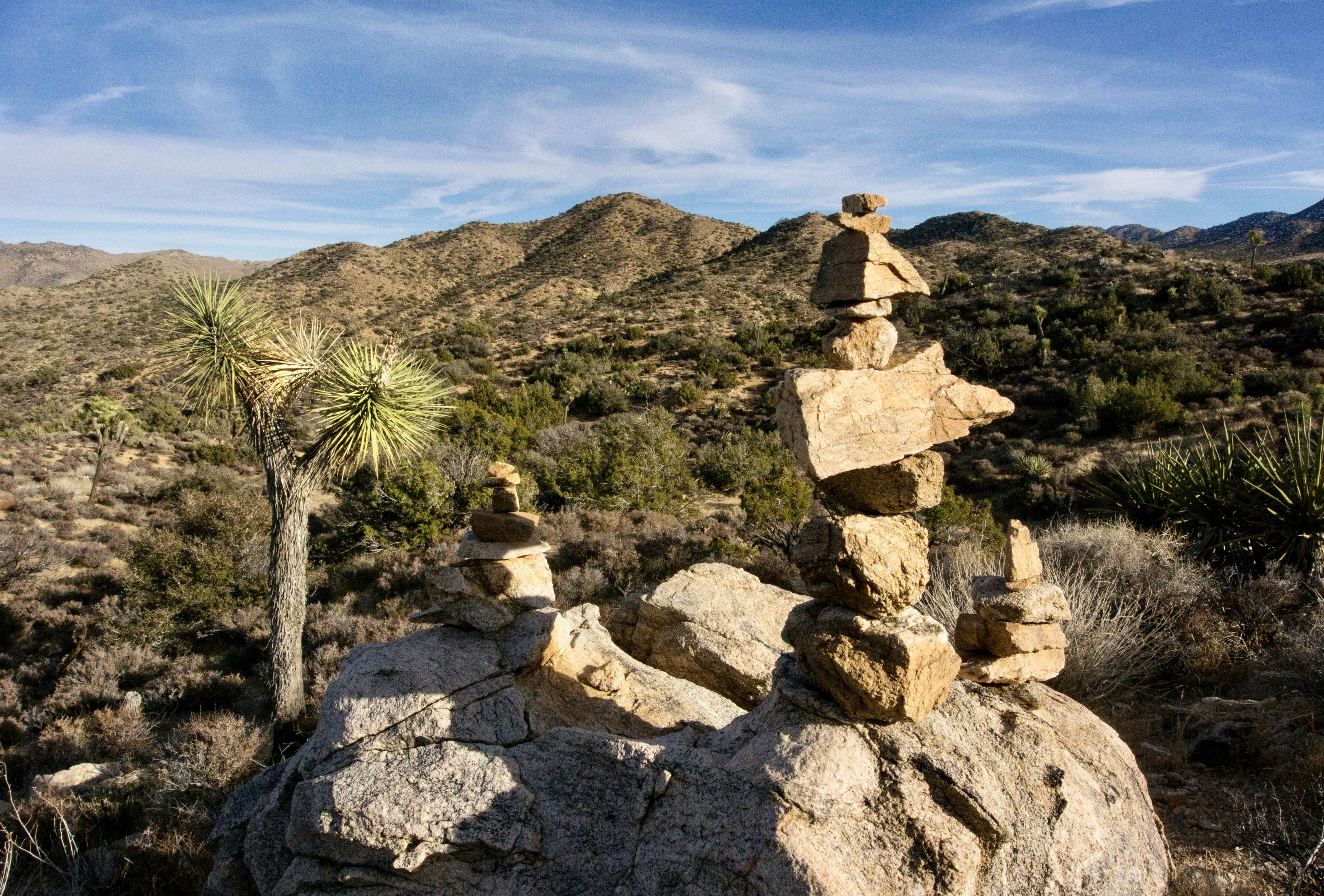 Rock cairns created by visitors in Joshua Tree National Park, California