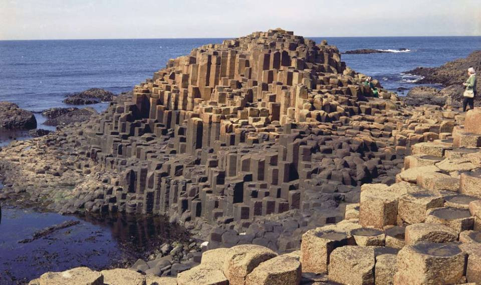 Giant's Causeway in Northern Ireland, an example of extrusive rock, featuring basalt columns formed from cooled lava