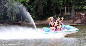 Dan Nicholas Park offers a variety of activities, including camping, a lake, carousel, train rides, a gem mine, an aquarium, a nature center, and animal habitats