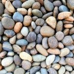 Multi colored rounded river rocks for landscaping