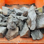 Landscaping rocks being transported in a truck bed