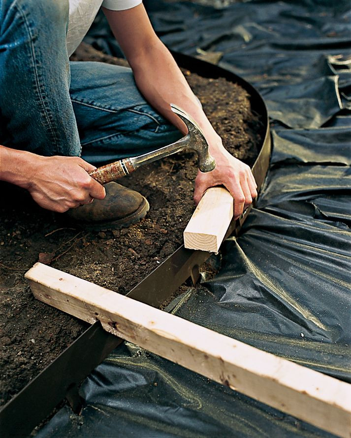 Installing edging for gravel path