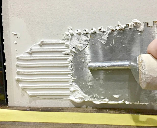 Cutting rock tile with a wet saw
