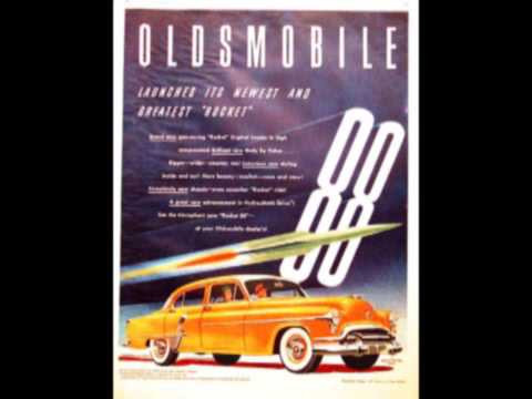 Arthur "Big Boy" Crudup performing "That's All Right, Mama" live, showcasing his energetic stage presence and powerful vocal delivery, embodying the raw spirit of early rock and roll.