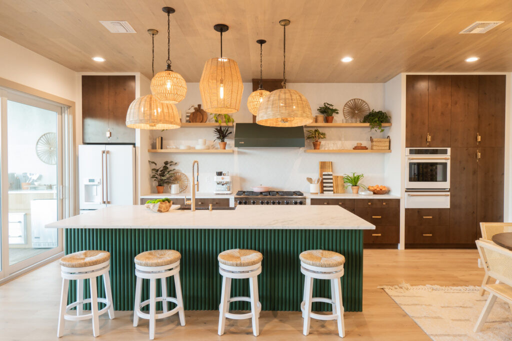 Elegant kitchen and dining area designed by Lyndsay and Leslie, incorporating modern and natural elements.