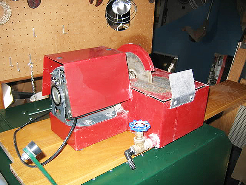 Rockbottom's Homemade 7-inch Trim Saw showcasing sheet metal work and a controlled drain