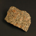 A sample of granite showing its black, white and grey crystal structure