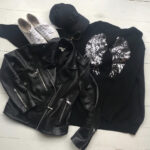 A Flat Lay Showing 7 Essentials for Midlife Rock Chicks
